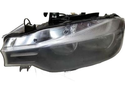BMW 63-11-7-365-599 Left Headlight Assembly