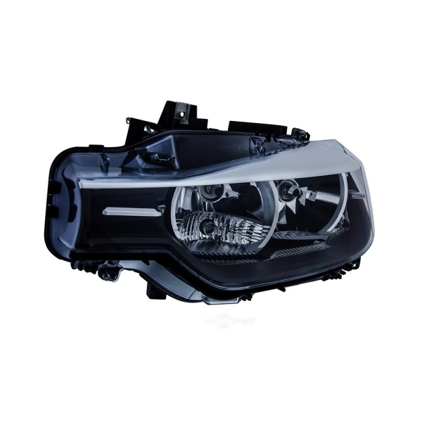 Hella Headlamp - Driver Side 354983051