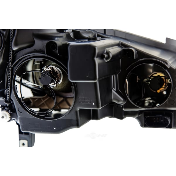 Hella Headlamp - Driver Side 009647971