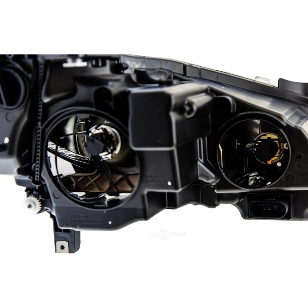 Hella Headlamp - Driver Side 009647971