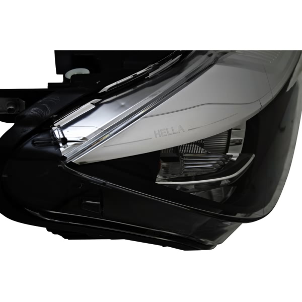 Hella Headlamp - Passenger Side SAE Hal 012101961