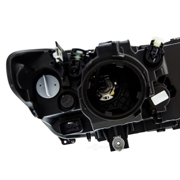 Hella Headlamp - Passenger Side 354983061