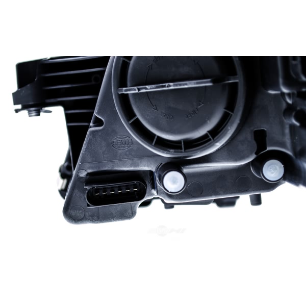 Hella Headlamp - Passenger Side 008821061