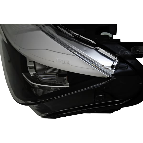 Hella Headlamp - Driver Side SAE Hal 012101951