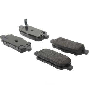 Centric Posi Quiet™ Extended Wear Semi-Metallic Rear Disc Brake Pads for 2004 Nissan Maxima - 106.09050