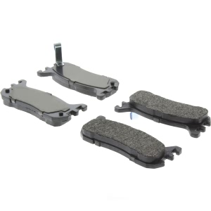 Centric Posi Quiet™ Extended Wear Semi-Metallic Rear Disc Brake Pads for 2001 Ford Escort - 106.06360